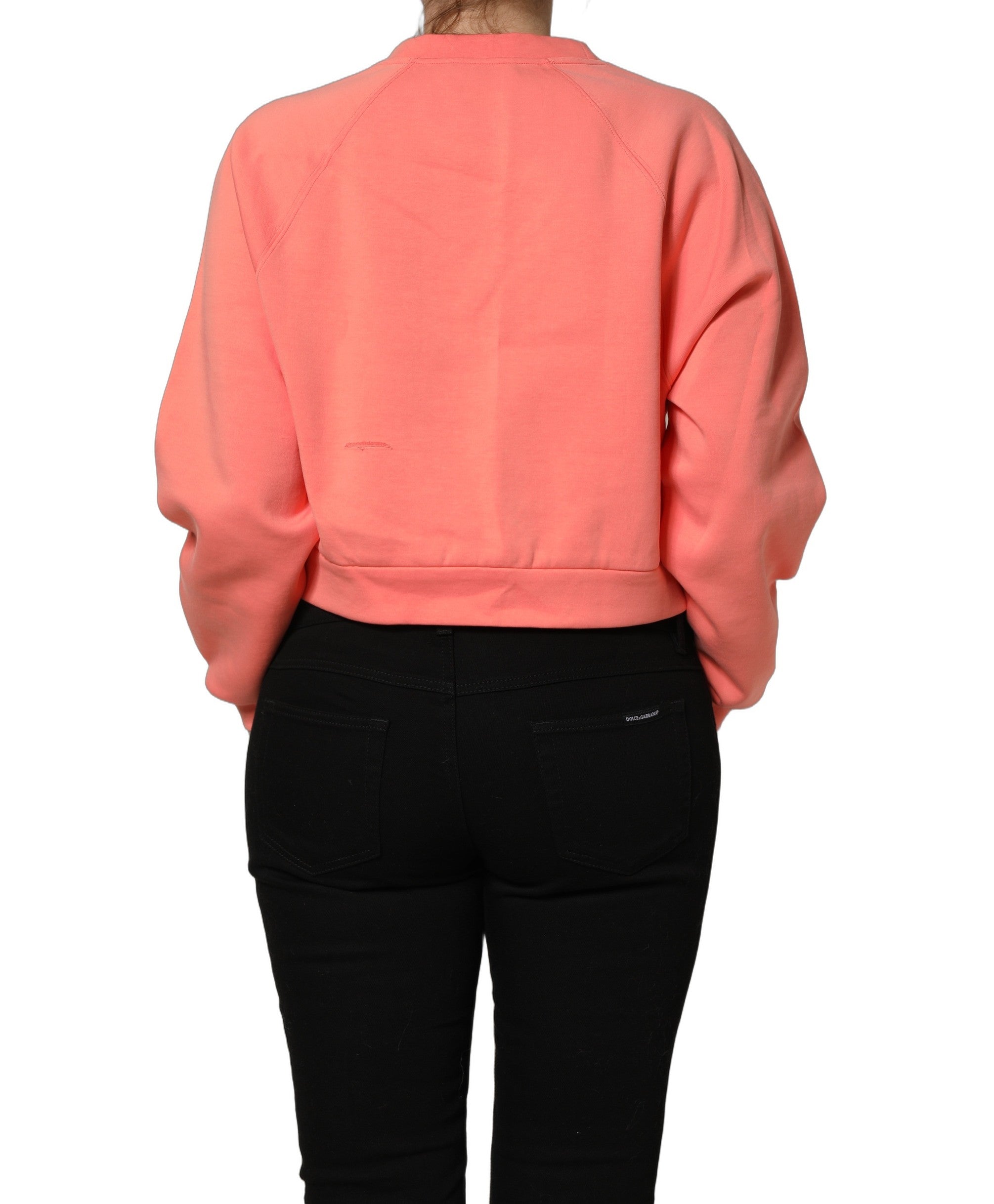 Sweat-shirt court rose à col rond graphique Dolce & Gabbana, pull en coton avec motif coloré et logo de la marque.