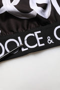 Soutien-gorge de sport noir Dolce & Gabbana DG Love Yourself, haut court en tissu extensible avec logo.
