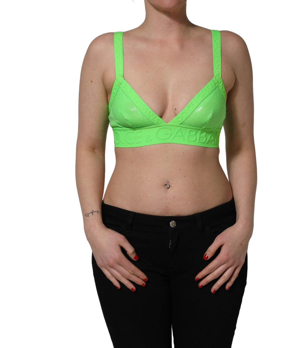 Soutien-gorge crop top Dolce & Gabbana en vert neon avec logo et bonnets souples, mode élégante et confortable.
