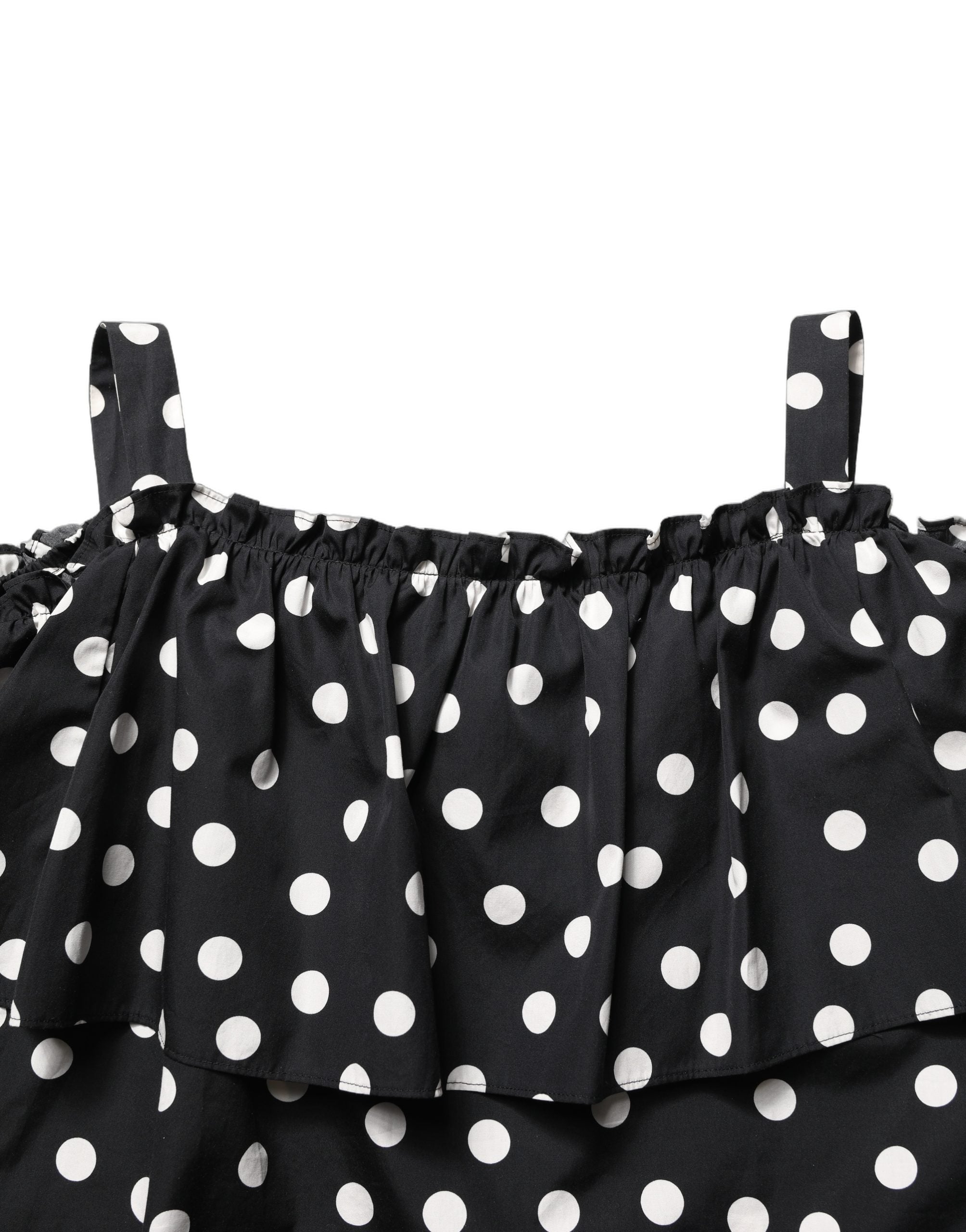 Top à pois noir et blanc Dolce & Gabbana, décolleté épaules, tissu léger, style élégant et tendance.