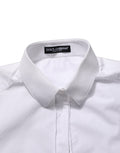 Chemise blanche en coton à manches longues de Dolce & Gabbana, boutonnière élégante et coupe classique.