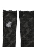 Chaussettes hautes en nylon stretch noire à fleurs en dentelle, par Dolce & Gabbana, avec motifs floraux élégants.