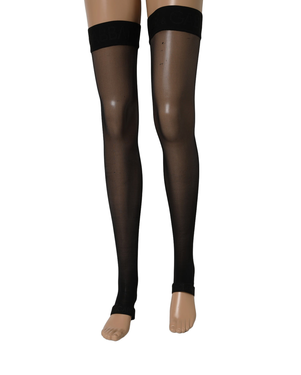 Chaussettes auto-fouetées en nylon noir transparent Dolce & Gabbana, mi-thigh, élégantes et délicates.
