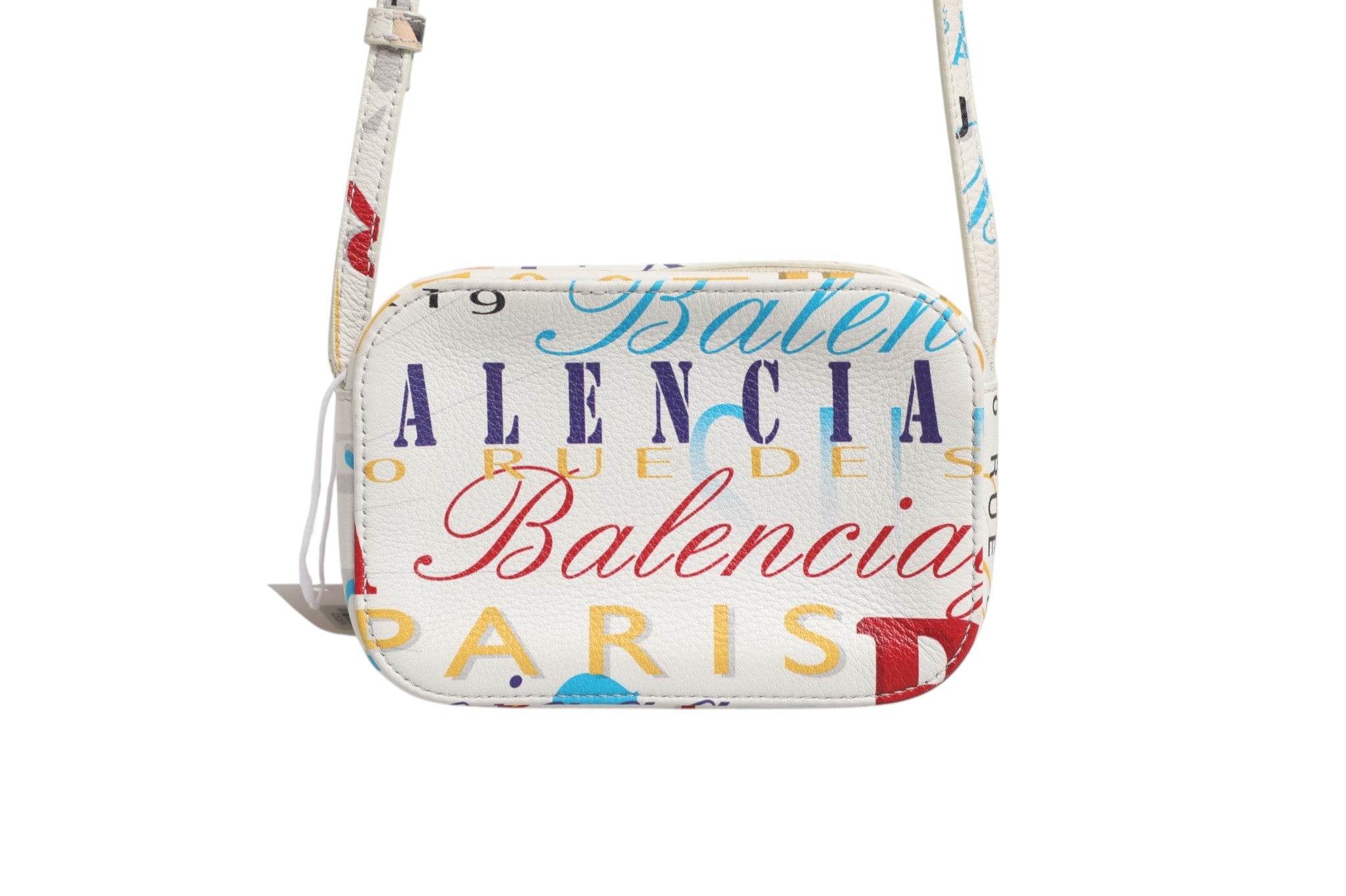 Sac à main Balenciaga City mini en cuir blanc avec imprimé graffiti, design élégant et moderne, vue de face.