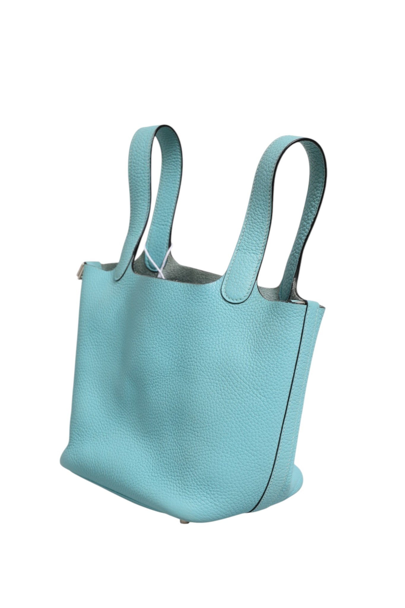 Sac Hermès Picotin Lock 18 en cuir avec poignée, détails métalliques et fermeture à boucle, vue de face.