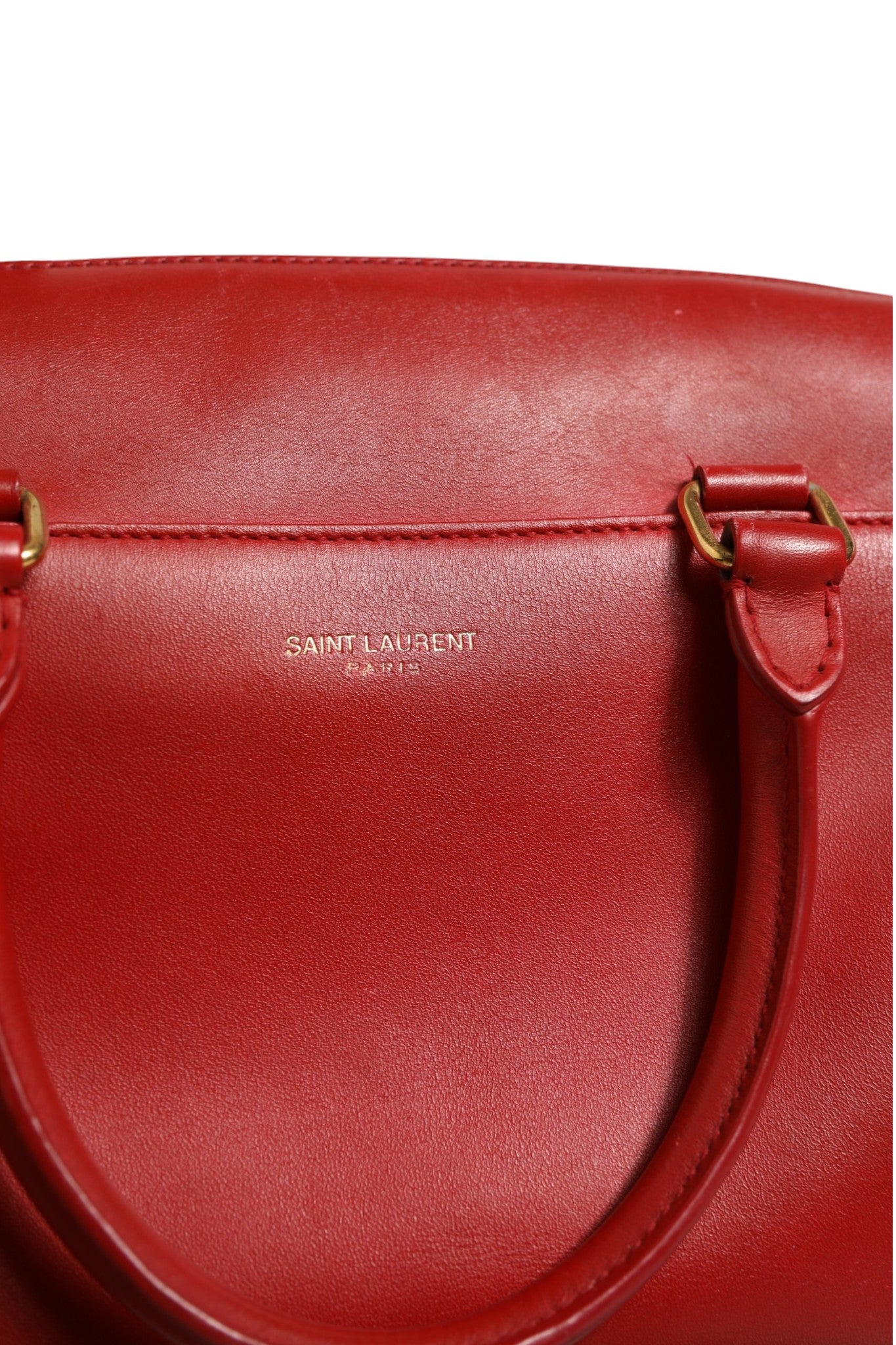 Sac de voyage Saint Laurent Classic Baby Duffle en cuir noir avec poignée et fermeture éclair, élégant et pratique.