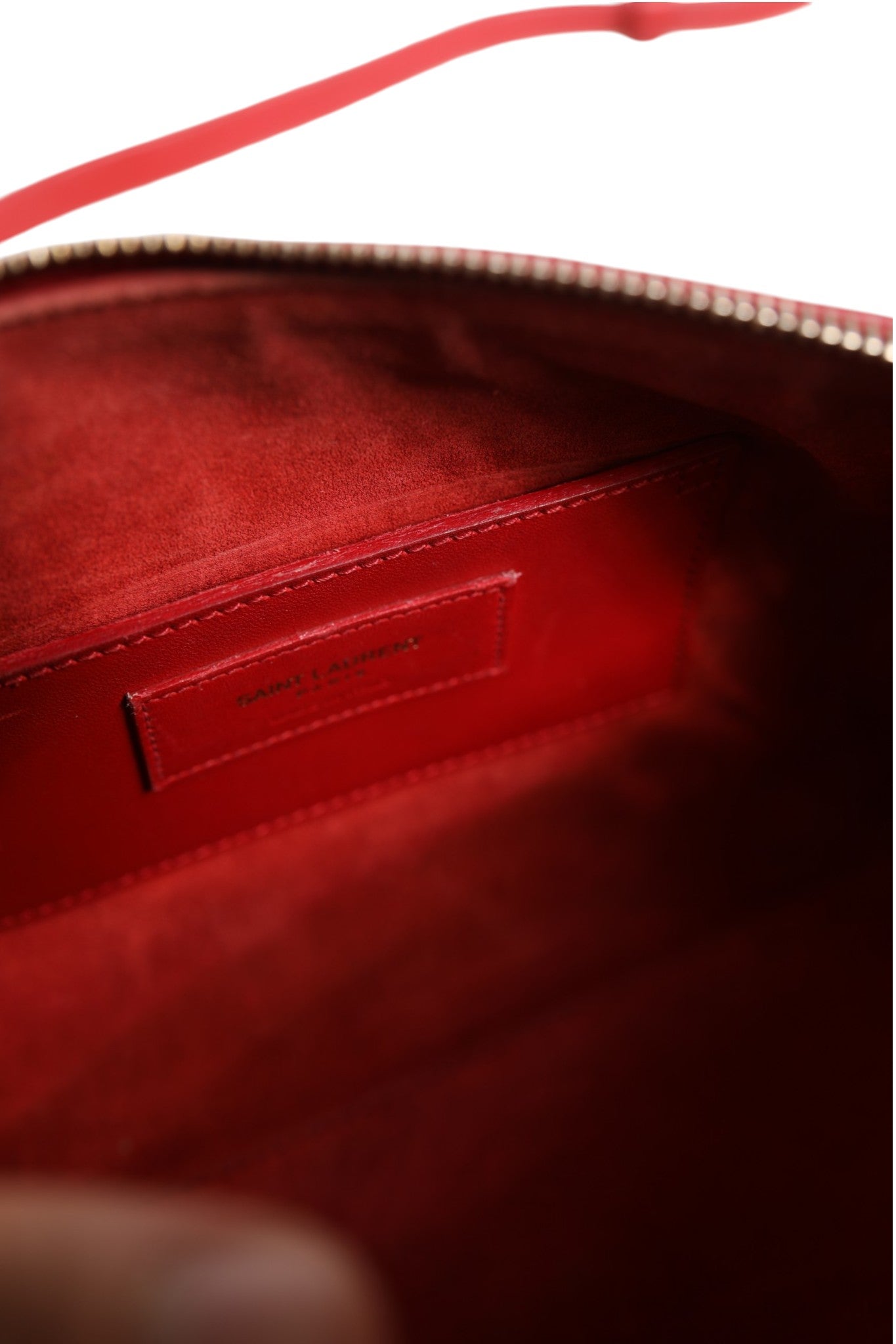 Sac à dos classique pour bébé Saint Laurent en cuir noir avec fermeture à cordon et logo signature.
