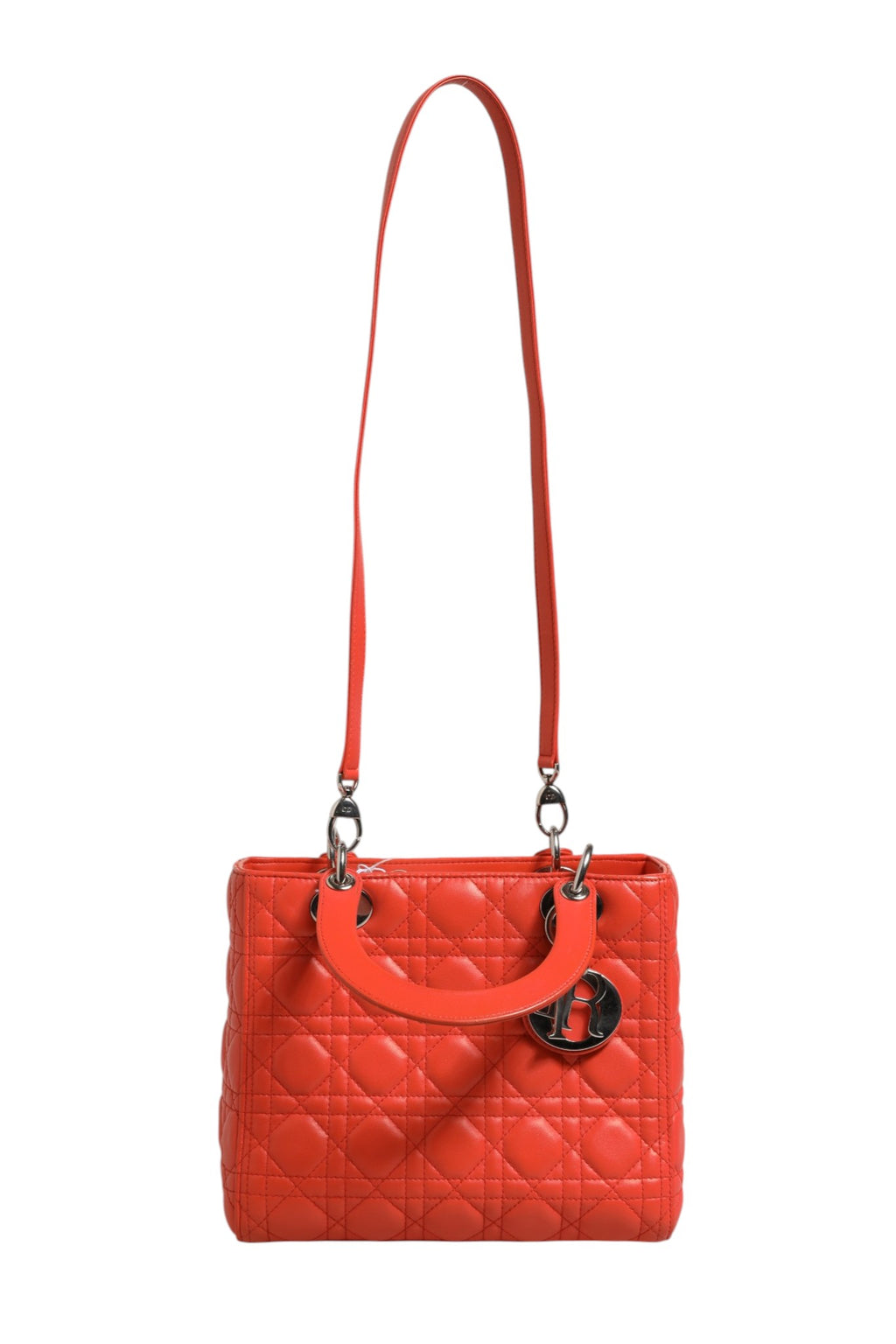 Sac à main Christian Dior Lady Dior en cuir d'agneau orange avec motif Cannage, élégant et sophistiqué.