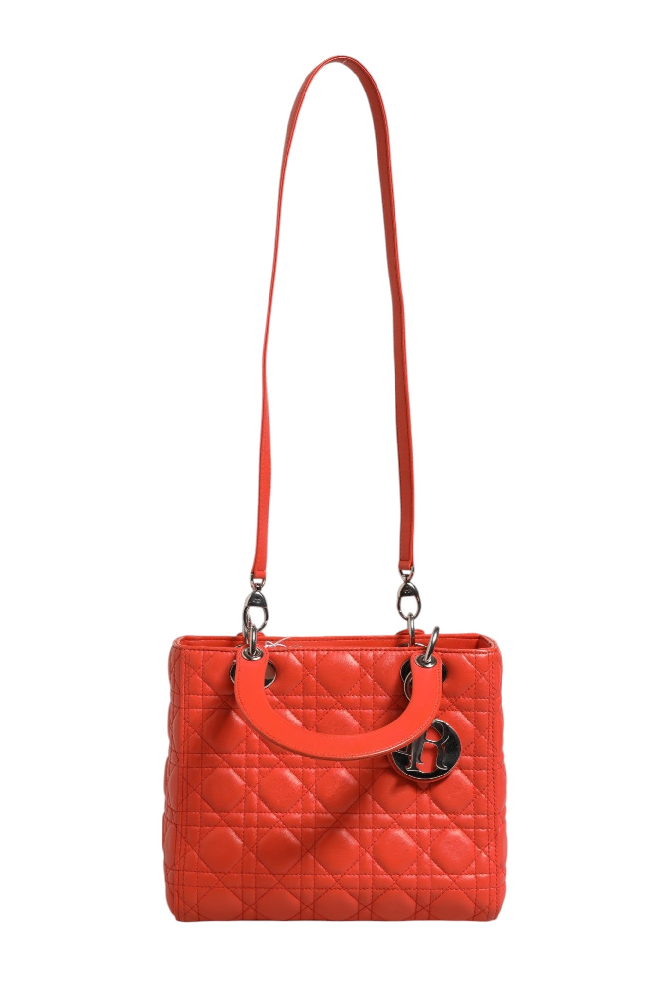 Sac à main Christian Dior Lady Dior en cuir d'agneau orange avec motif Cannage, élégant et sophistiqué.