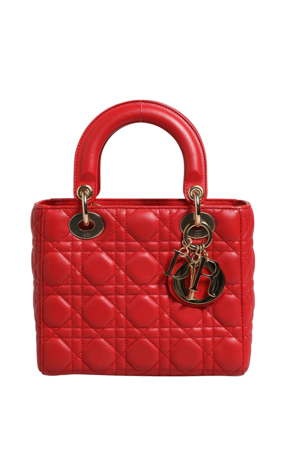 Sac à main en cuir Dior Lady Dior avec motif cannage, poignée en chaîne dorée et logo Christian Dior visible.