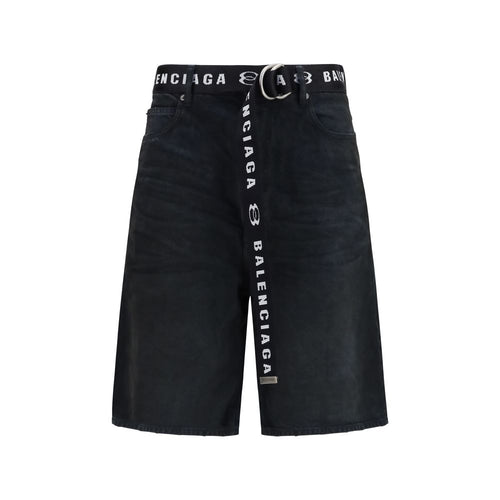 Shorts bermuda en coton noir de Balenciaga, style décontracté avec coupe moderne, visibles en gros plan.