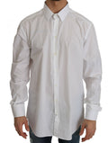 Chemise slim blanche Dolce & Gabbana en coton 100 % avec détails dorés visible sur l'image.