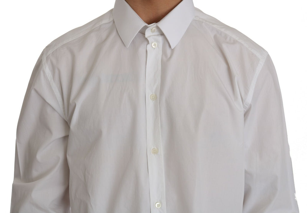Chemise blanche Dolce & Gabbana en coton à coupe slim, élégante et légère, avec détails dorés visibles sur l'image.