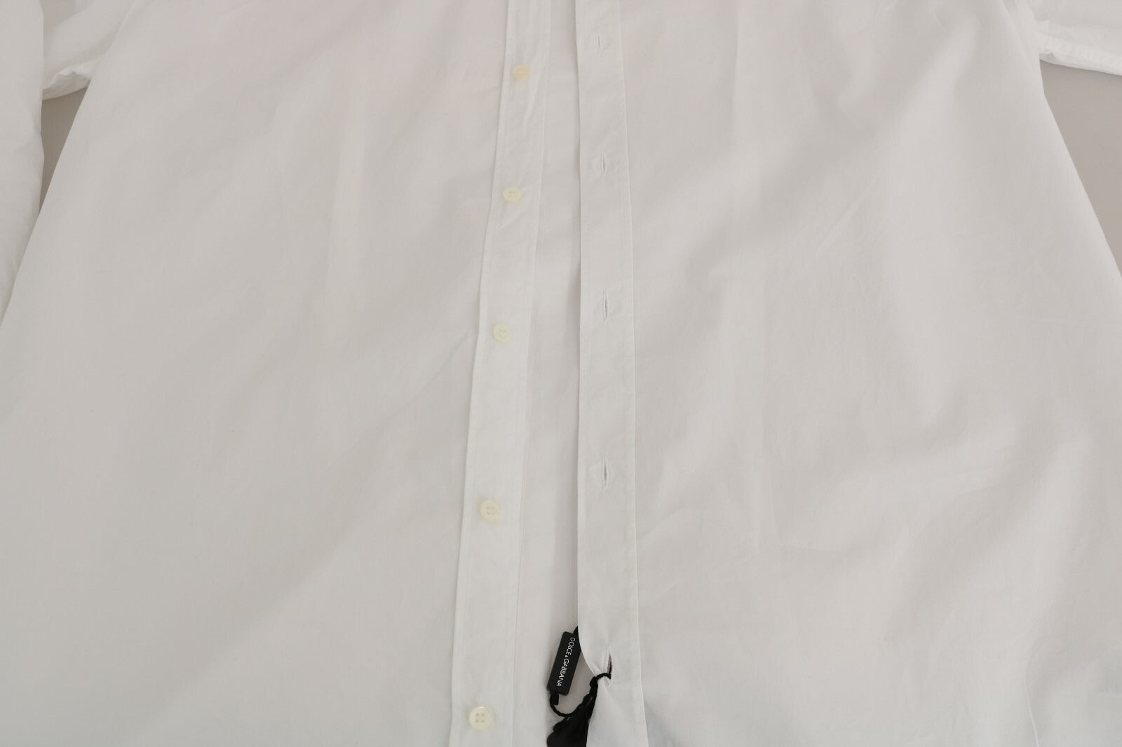 Chemise Slim Dolce & Gabbana blanche en coton 100% avec détails dorés, élégante et sophistiquée pour homme.