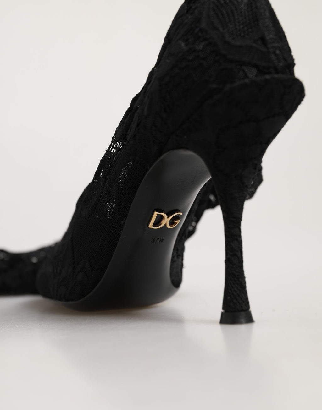 Chaussures Dolce & Gabbana Taormina en dentelle noire, bottines à talons élégantes et sophistiquées pour femme.