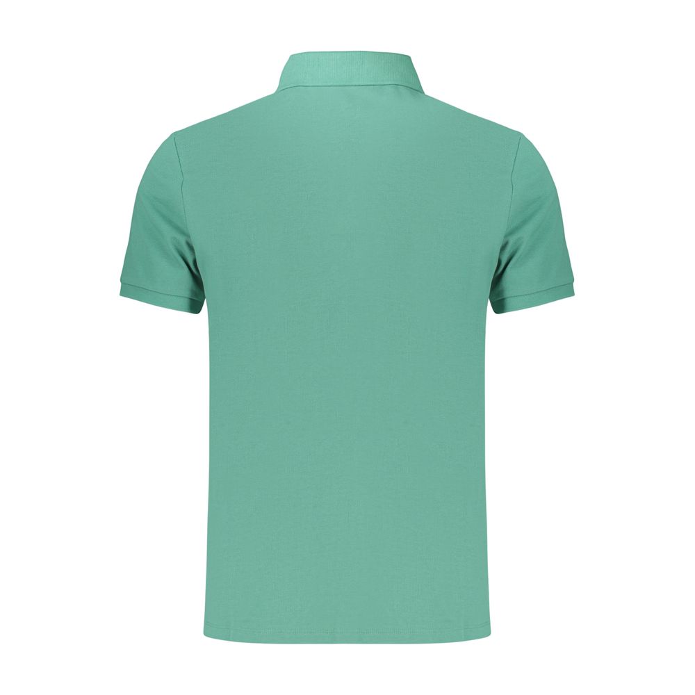 Polo homme en coton vert de la marque Calvin Klein, détail du col et du logo sur la poitrine.