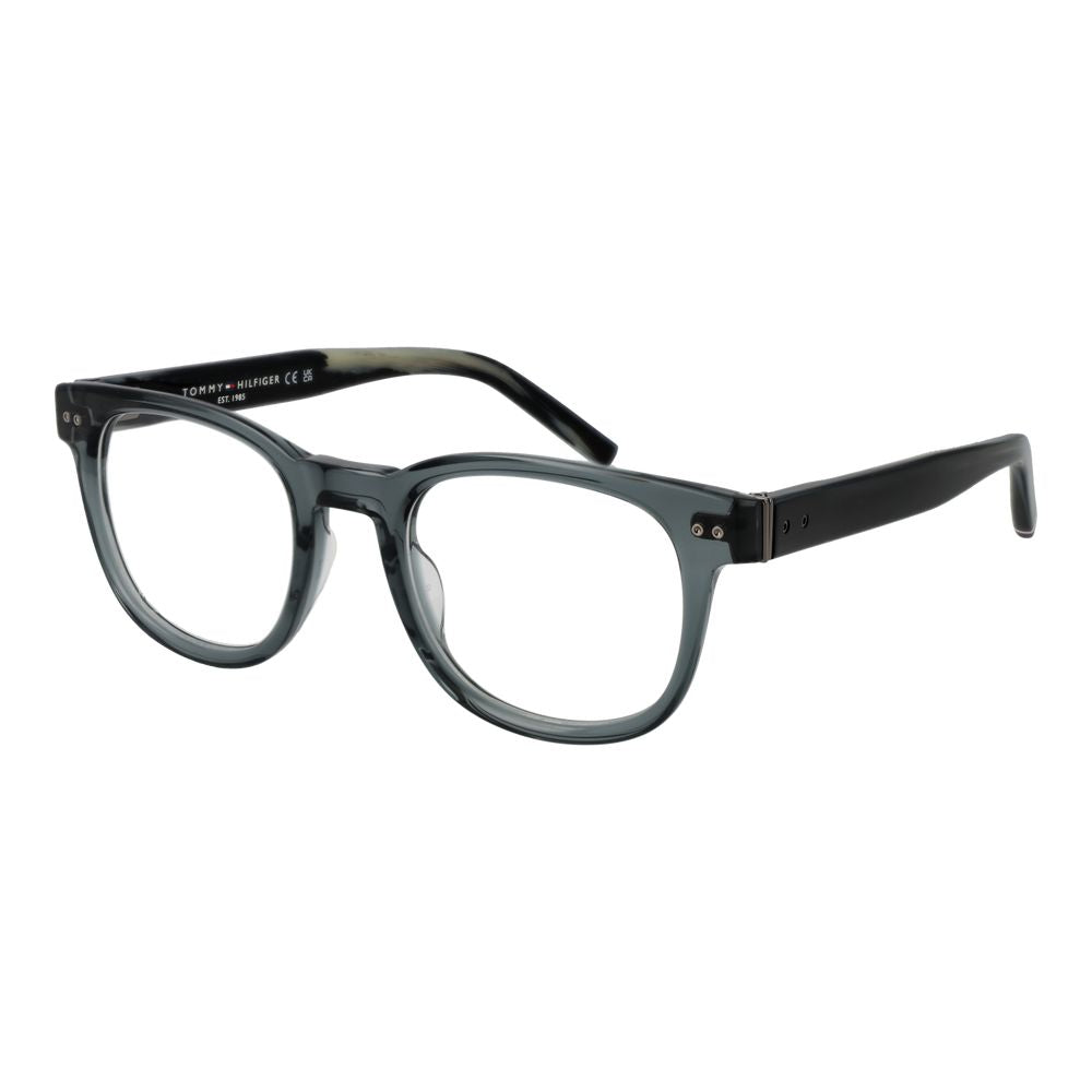 Lunettes en acétate gris Tommy Hilfiger avec monture élégante, visibles sur fond clair, pour un style sophistiqué.