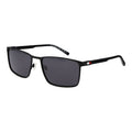 Lunettes de soleil en métal noires Tommy Hilfiger avec monture élégante et design moderne, visibles en gros plan.