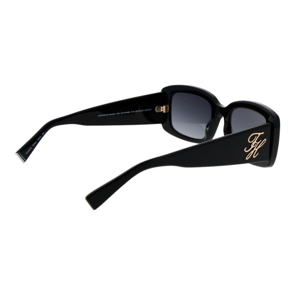 Lunettes de soleil Tommy Hilfiger en acétate noir avec monture rectangulaire et branches épaisses.