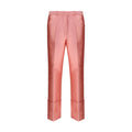 Pantalons décontractés en polyester multicolore de la marque Calvin Klein, vue en gros plan sur le tissu et la coupe.