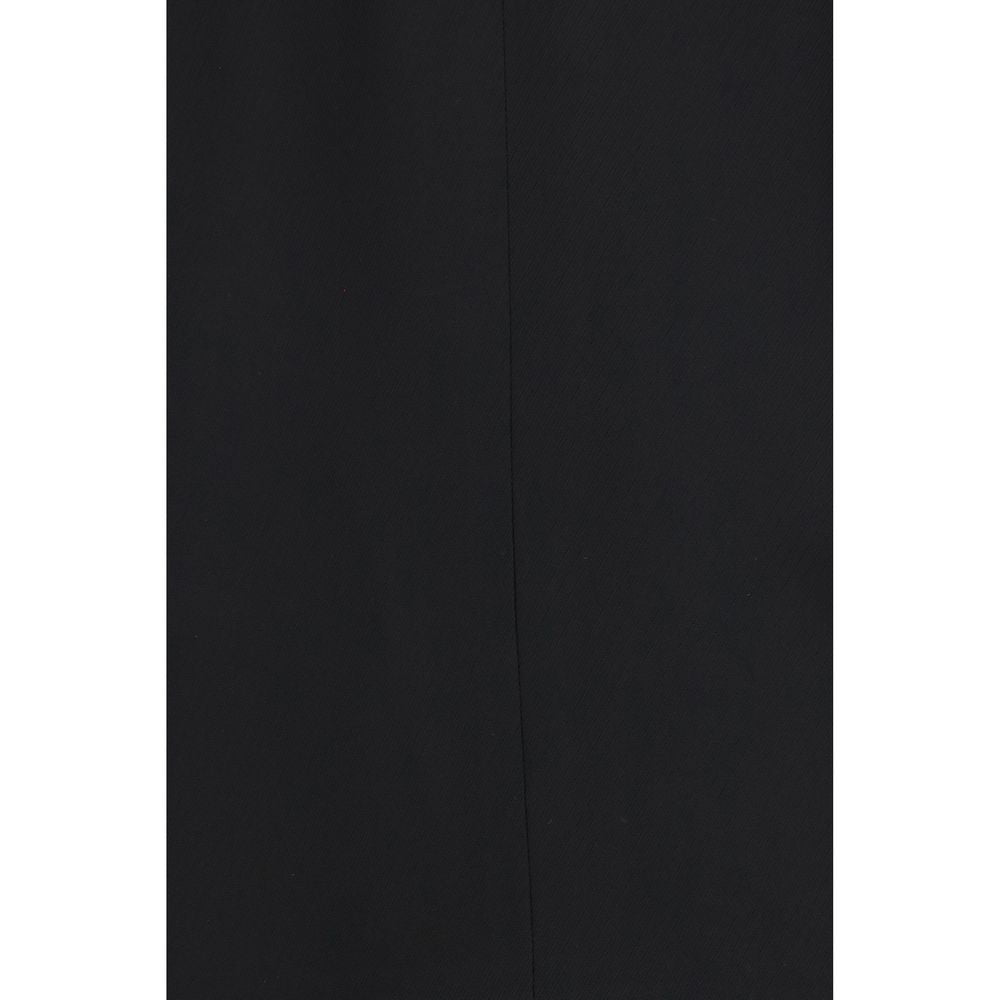 Veste longue en viscose noire de Calvin Klein, coupe élégante, portée ouverte, détail de col et manches classiques.