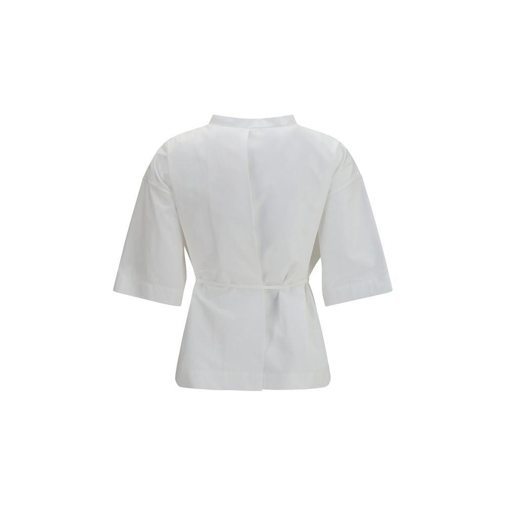 Chemise blanche à manches courtes en coton de la marque Calvin Klein, affichée sur un mannequin.