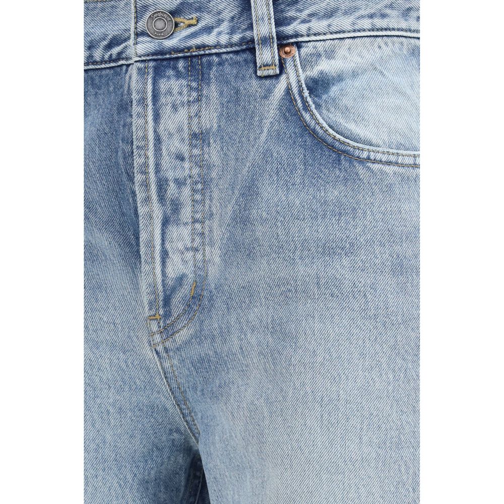 Jeans cropped en coton bleu de Saint Laurent, coupe tendance, détails modernes, style décontracté et élégant.