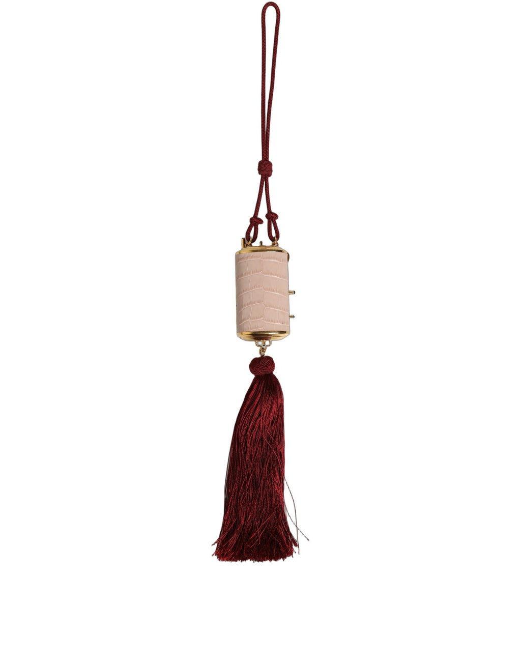 Trousse à maquillage Dolce & Gabbana en cuir exotique rose avec mini miroir et tassel, design élégant et sophistiqué.