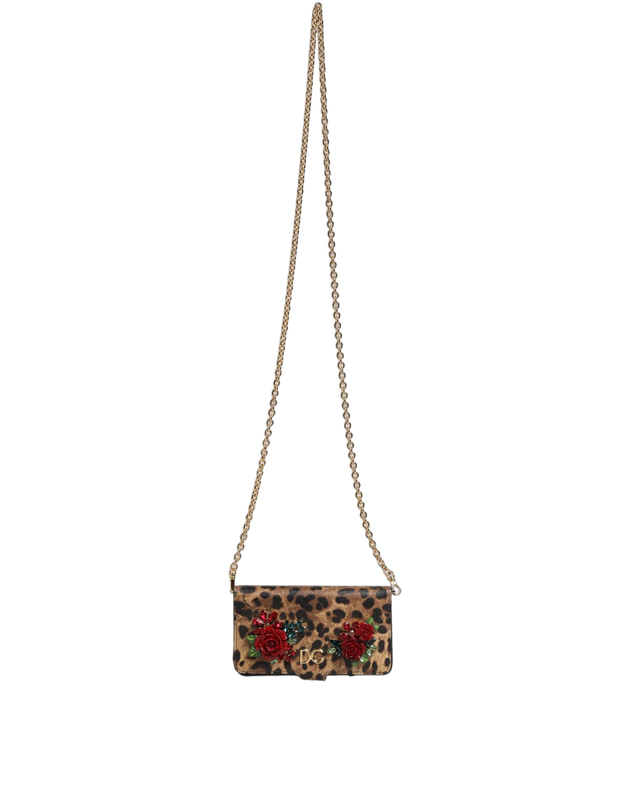 Coque pour iPhone X/XS Dolce & Gabbana en cuir marron avec motif léopard et cristaux, protection élégante et sophistiquée.