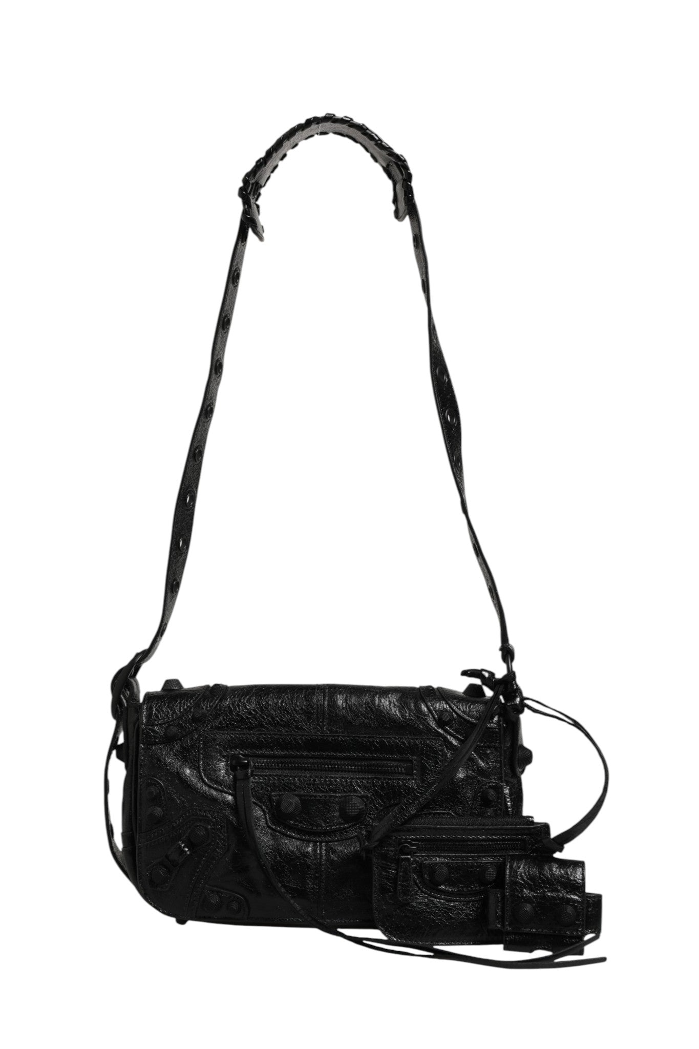 Sac à bandoulière Balenciaga Le Cagole XS avec fermeture à rabat, en cuir noir avec détails métalliques.