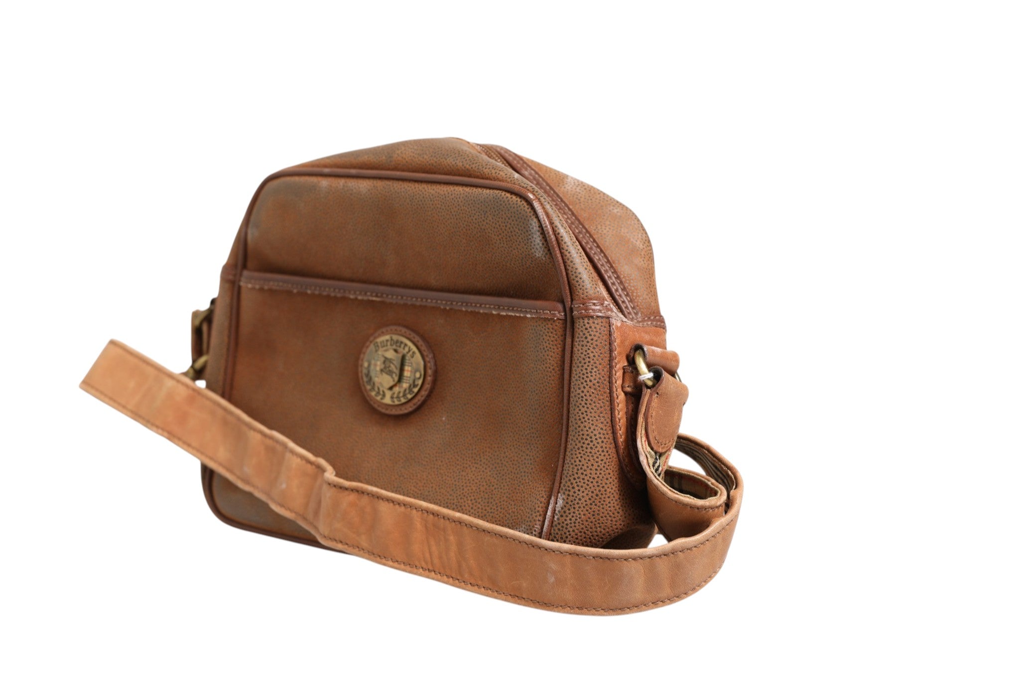 Sac à bandoulière Burberry marron et or avec logo emblématique, chaîne en métal et design élégant visible dans l'image.