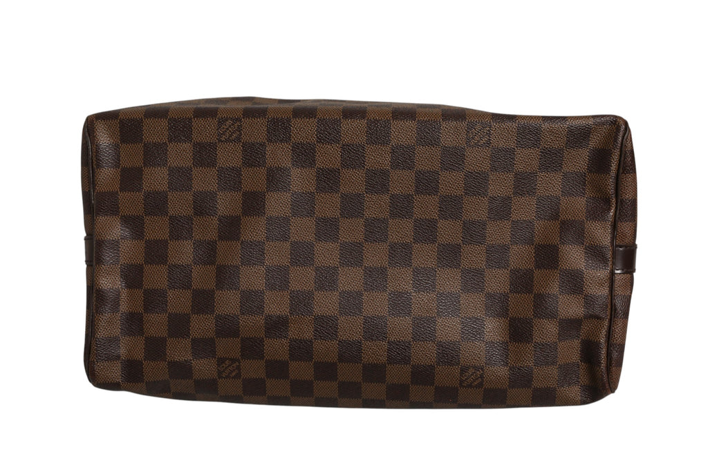 Sac Louis Vuitton Speedy Bandoulière 35 Damier Ebene, sac à main élégant avec motif checkered en tissu et poignée en cuir.
