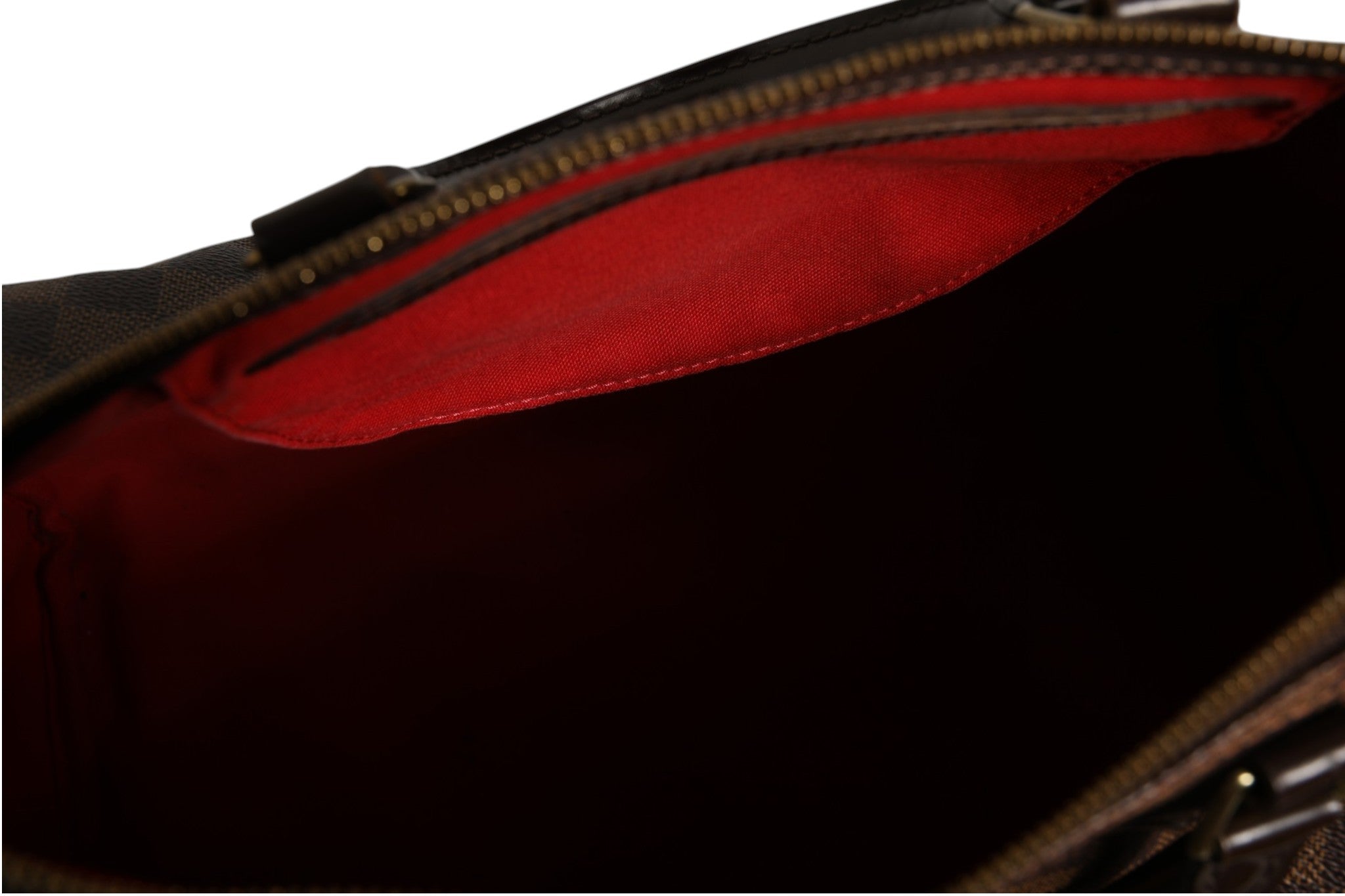 Sac Louis Vuitton Speedy Bandoulière 35 en toile Damier Ebene, sac à main élégant avec poignée en cuir et bandoulière réglable.