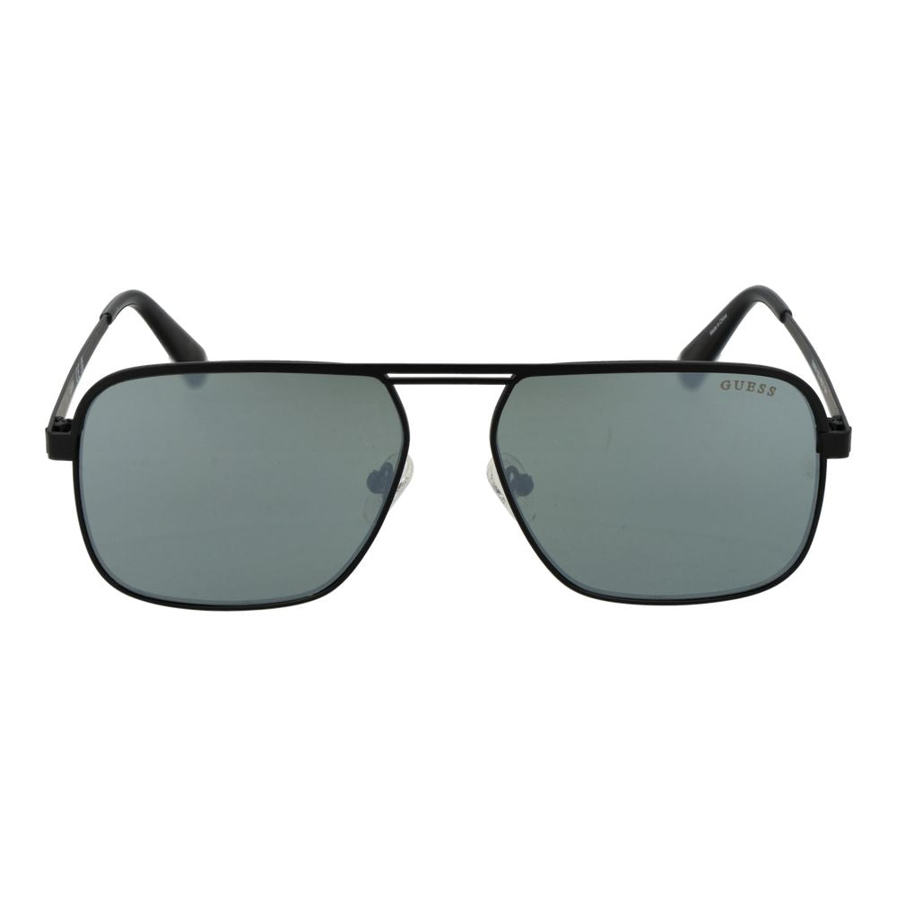 Lunettes de soleil Guess en métal noir, avec monture rectangulaire élégante et verres foncés pour un look tendance.