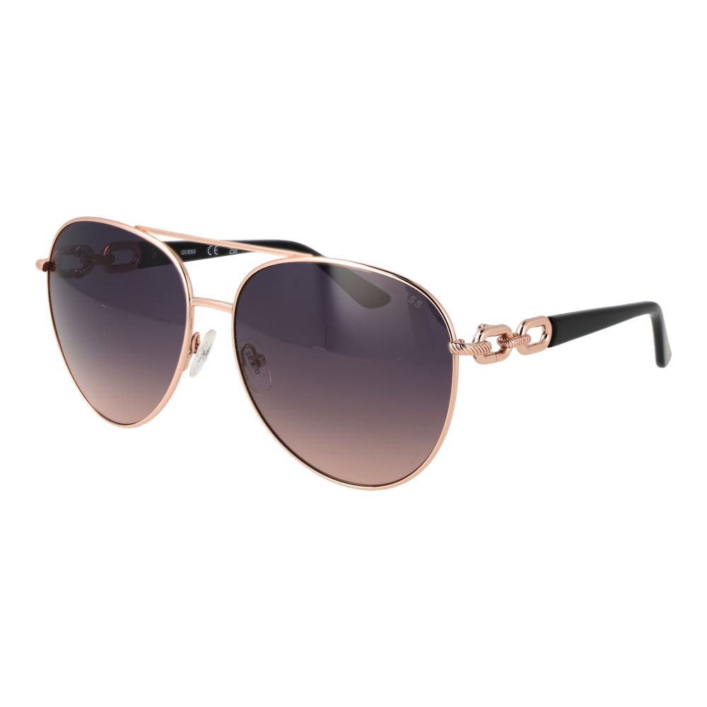 Lunettes de soleil en métal or rose Guess, style élégant avec monture fine et verres teintés, pour un look tendance.