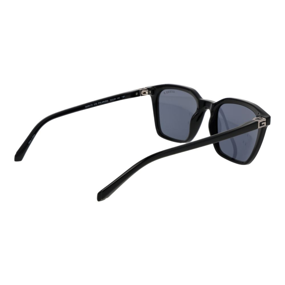 Lunettes de soleil en plastique noir de la marque Guess avec monture élégante et design moderne.