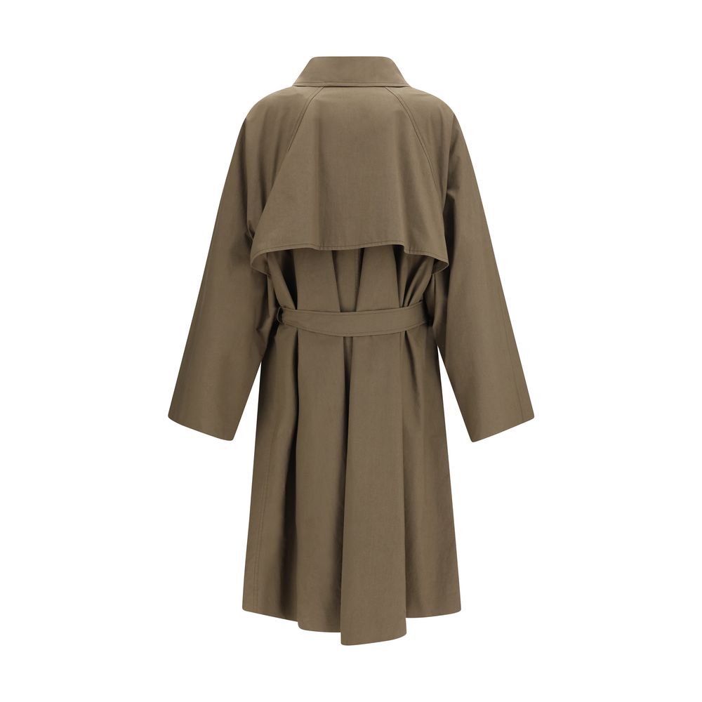 Manteau trench bicolore en coton de Calvin Klein, élégant et classique, avec ceinture et boutons visibles.