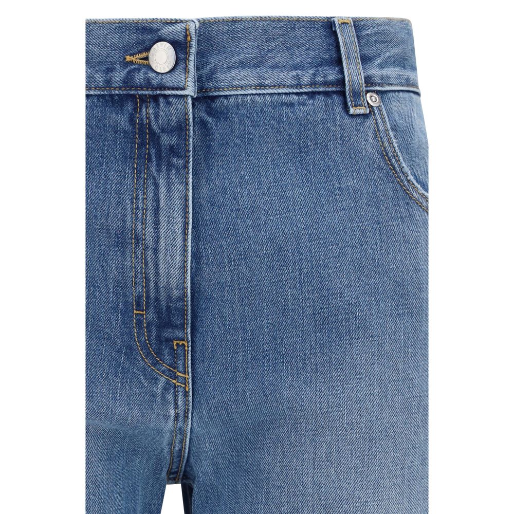 Jeans droits en coton bleu de Calvin Klein, vue de face, détails des poches et couture visibles.