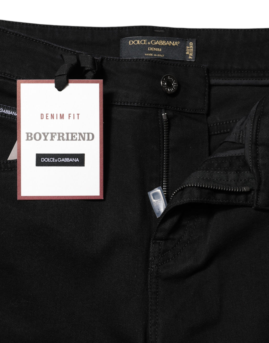 Jean boyfriend noir en denim stretch en coton Dolce & Gabbana, vue en gros plan sur la texture et la coupe.