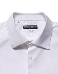 Robe chemise blanche en coton popeline Dolce & Gabbana, style formel, avec col et manches longues, vue de face.