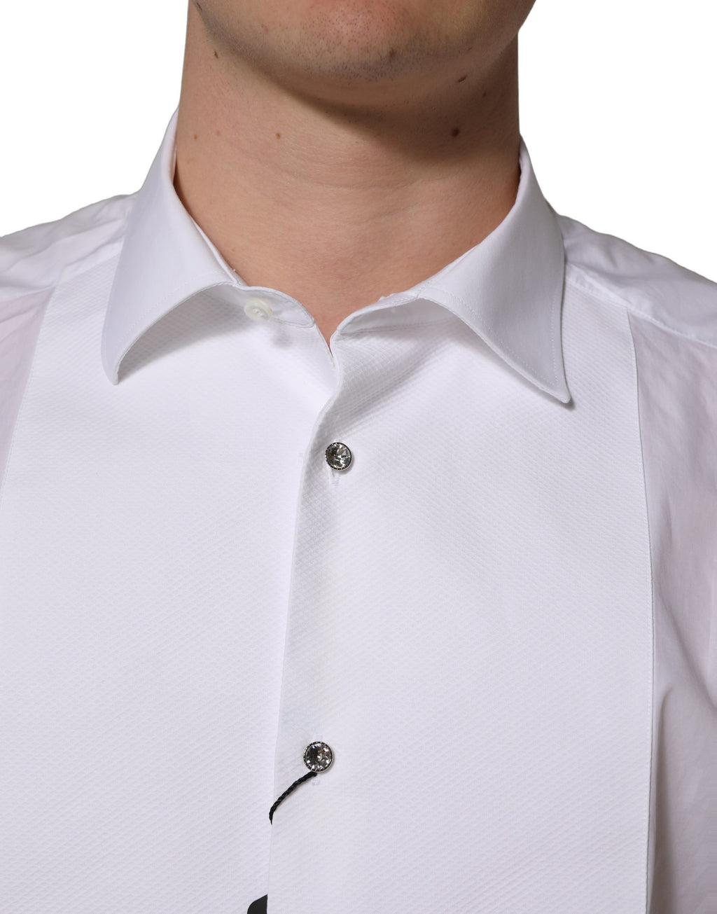 Robe blanche en coton popeline Dolce & Gabbana, style formel avec col et boutons, vêtement élégant pour occasion spéciale.