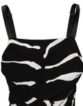 Robe longue en cady noir et blanc à motif zèbre de Dolce & Gabbana, longueur jusqu'aux mollets, élégant design animalier.