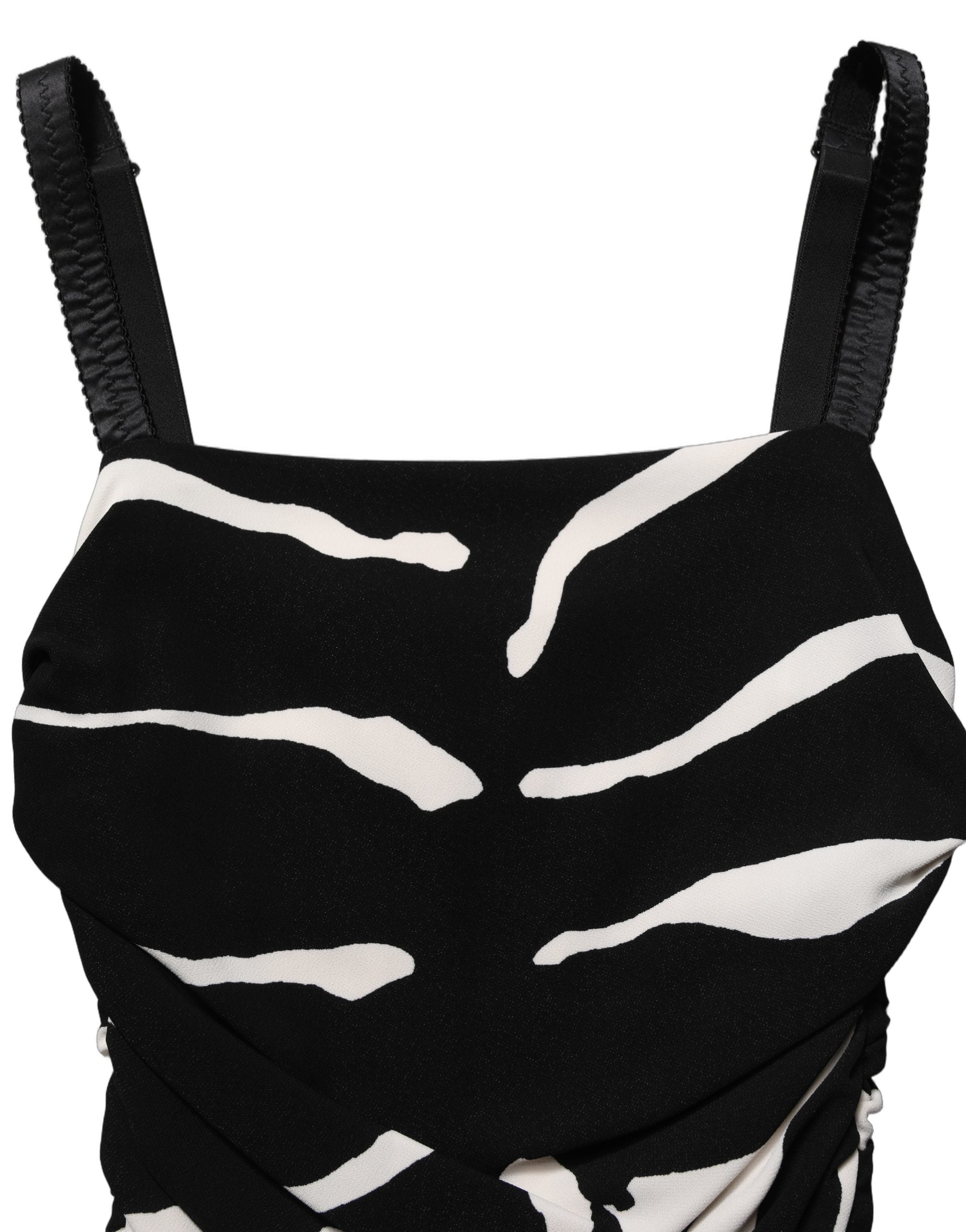 Robe longue en cady noir et blanc à motif zèbre de Dolce & Gabbana, longueur jusqu'aux mollets, élégant design animalier.