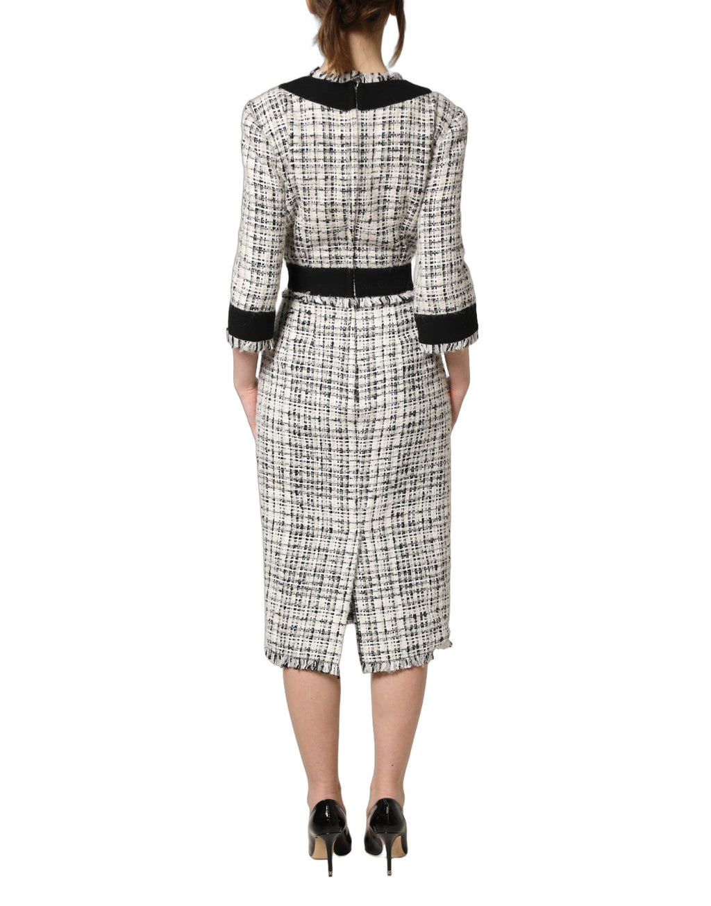 Robe midi Dolce & Gabbana en tweed noir et blanc, coupe cintrée et ligne A, élégante et sophistiquée.