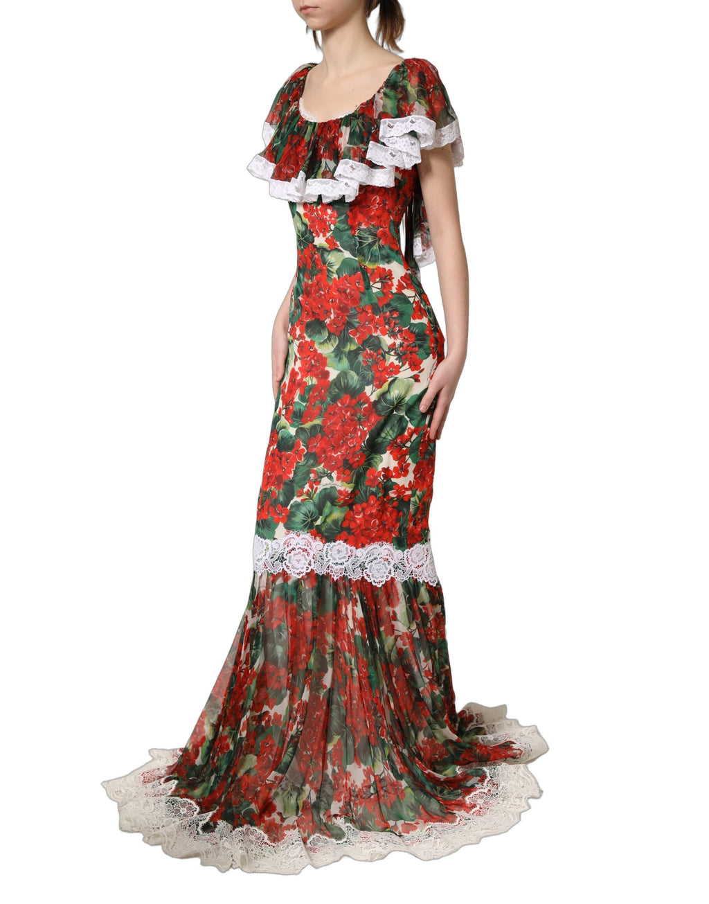 Robe longue à dentelle multicolore avec motifs de géranium, marque Dolce & Gabbana, élégante et florale.