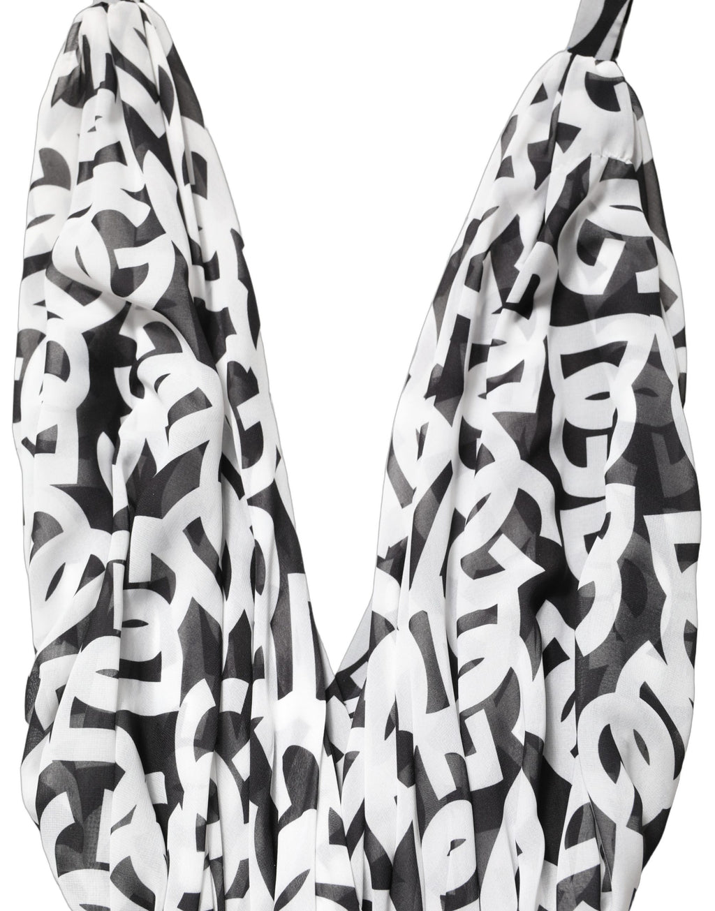 Robe longue sans manches noir et blanc Dolce & Gabbana avec logo, longueur au sol, élégante et sophistiquée.