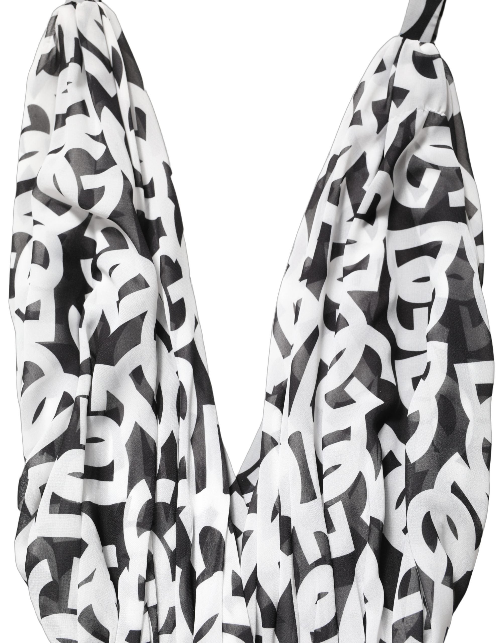 Robe longue sans manches noir et blanc Dolce & Gabbana avec logo, longueur au sol, élégante et sophistiquée.
