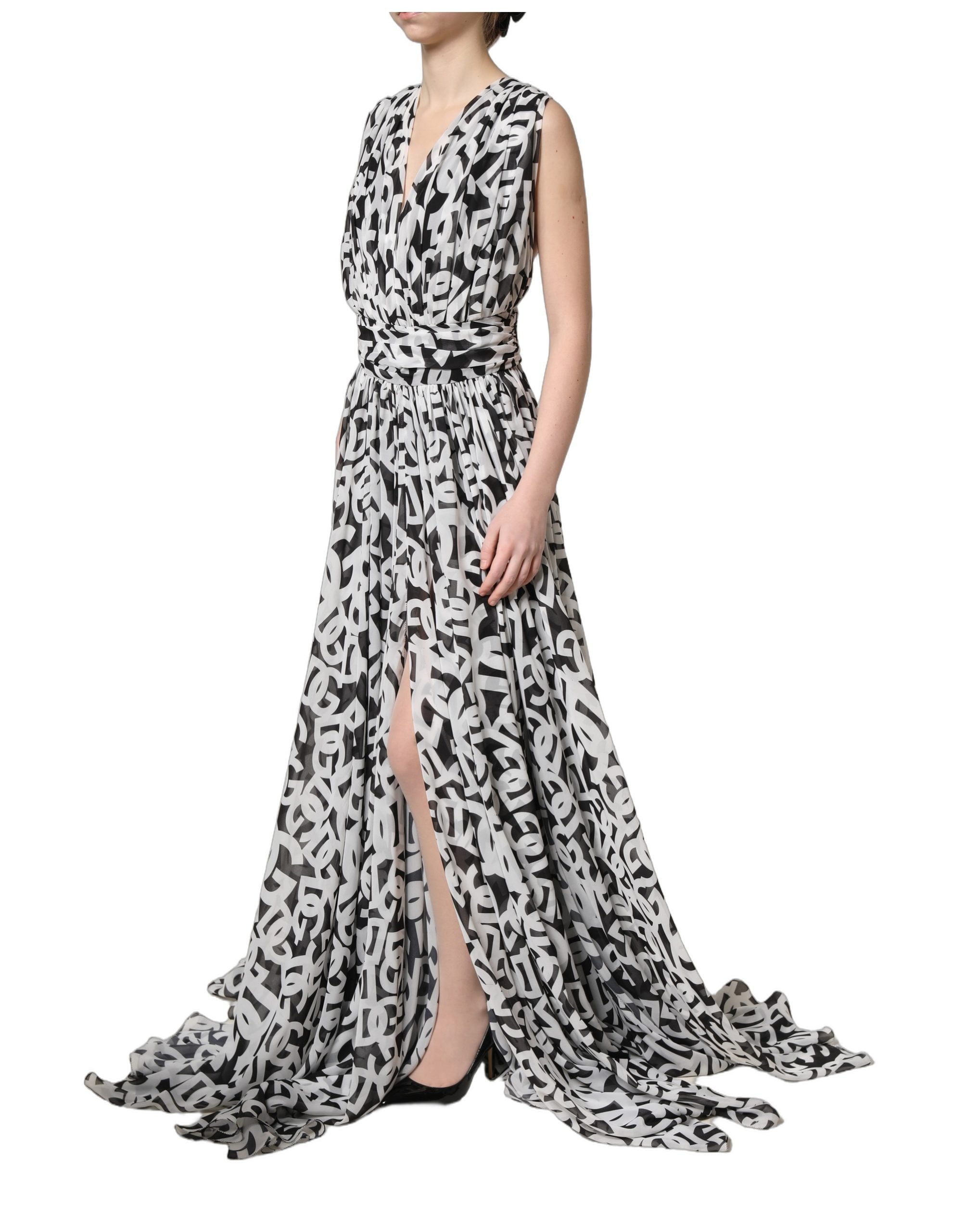 Robe longue sans manches en noir et blanc Dolce & Gabbana avec logo, longueur au sol, élégante et sophistiquée.