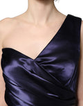 Robe de soirée bleue marine à une épaule Dolce & Gabbana, élégante et fluide, avec détails sophistiqués pour une occasion spéciale.