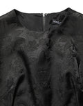 Robe sans manches Dolce & Gabbana en jacquard floral noir, coupe en ligne A élégante et raffinée.